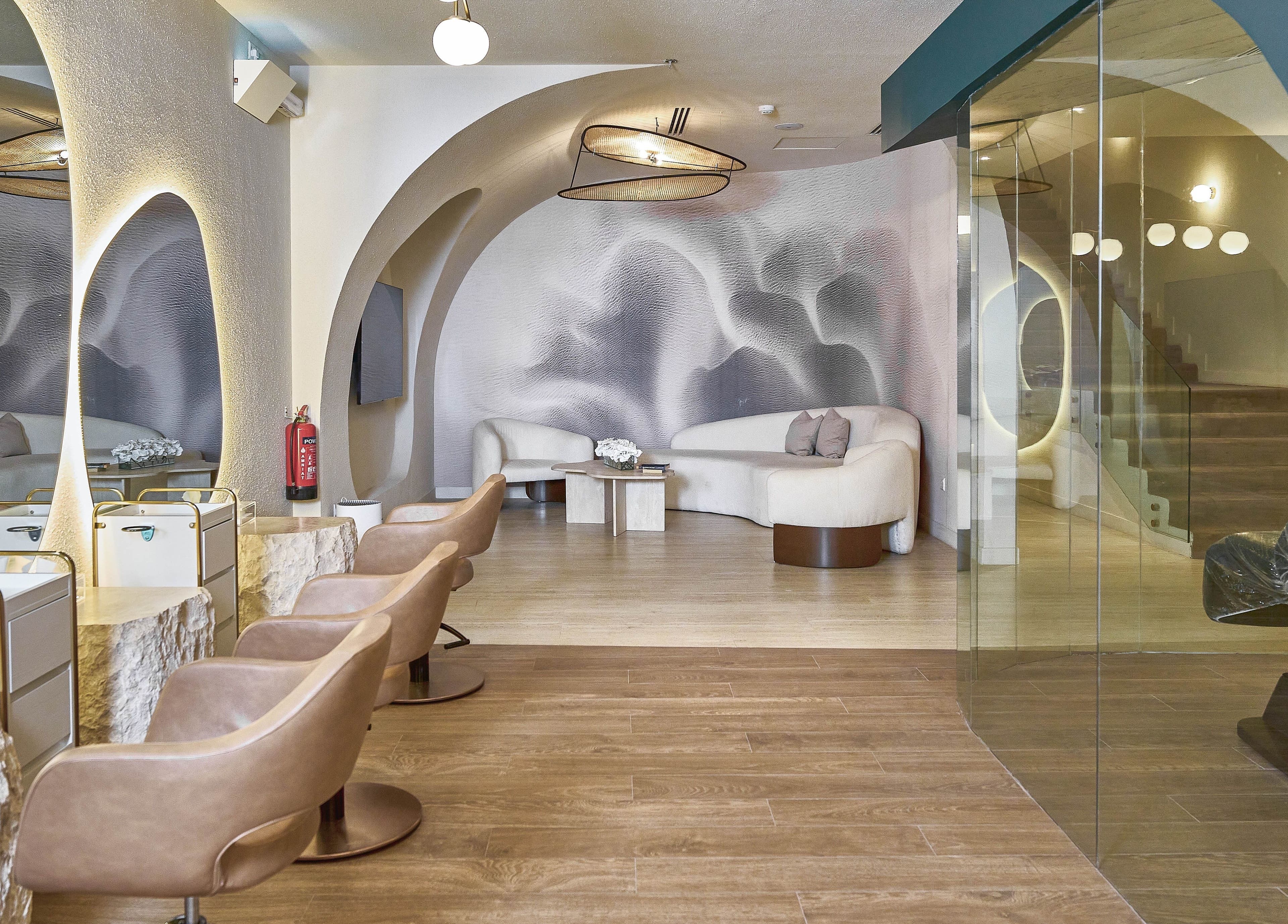 Chic interior of Obar Beauty in Riyadh, Riyadh Province, SA with cozy seating and ambient lighting.