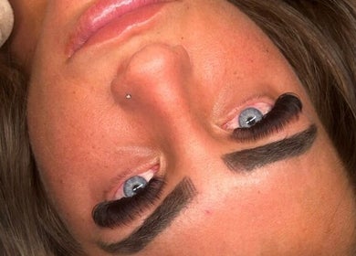 Close-up of enhanced eyelashes at Charlie May’s Beauty Room, Wallington, England, GB.