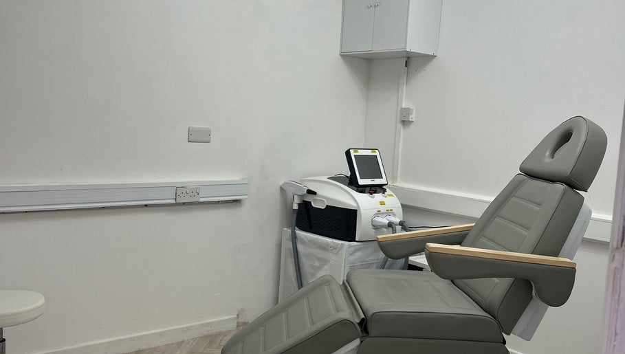 Advanced treatment room at Laser Luxe Clinic, Rochdale, England, GB showcasing modern laser equipment.