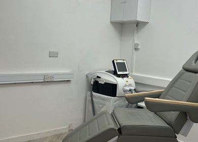 Advanced treatment room at Laser Luxe Clinic, Rochdale, England, GB showcasing modern laser equipment.