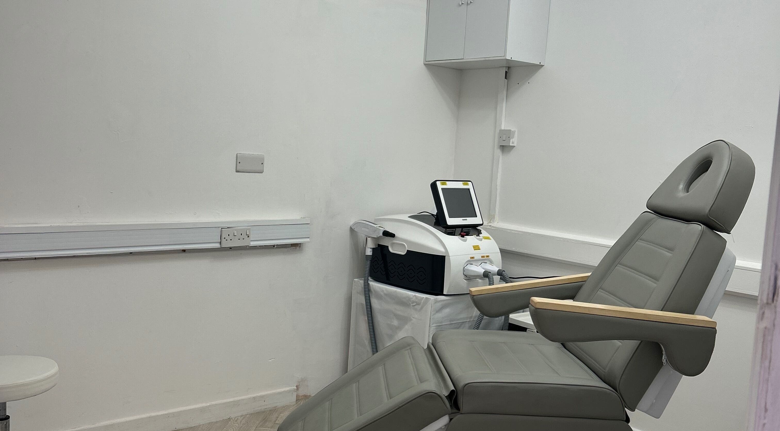Comfortable treatment room with laser equipment at Laser Luxe Clinic in Rochdale, England, GB.