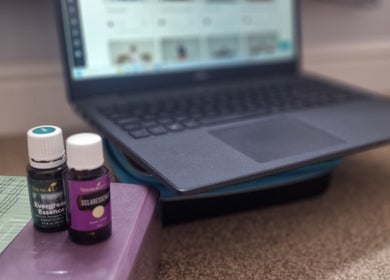 Essential oils and laptop at Amanda Smith Holistics - Framlingham, enhancing wellbeing in Framlingham, England, GB.