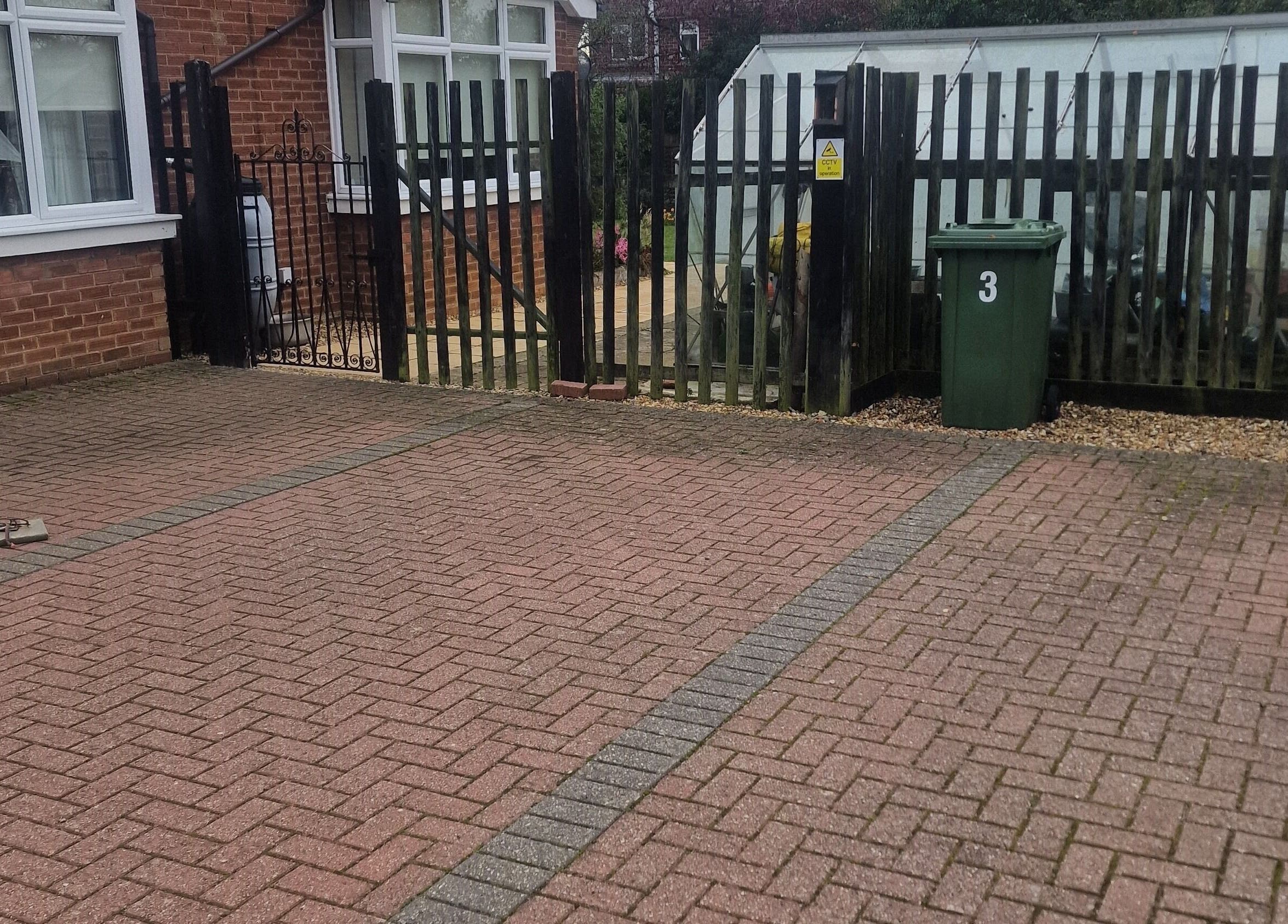 Entrance pathway at Wilmslow Avenue, Woodbridge, featuring a welcoming brick design. Located in Woodbridge, England, GB.
