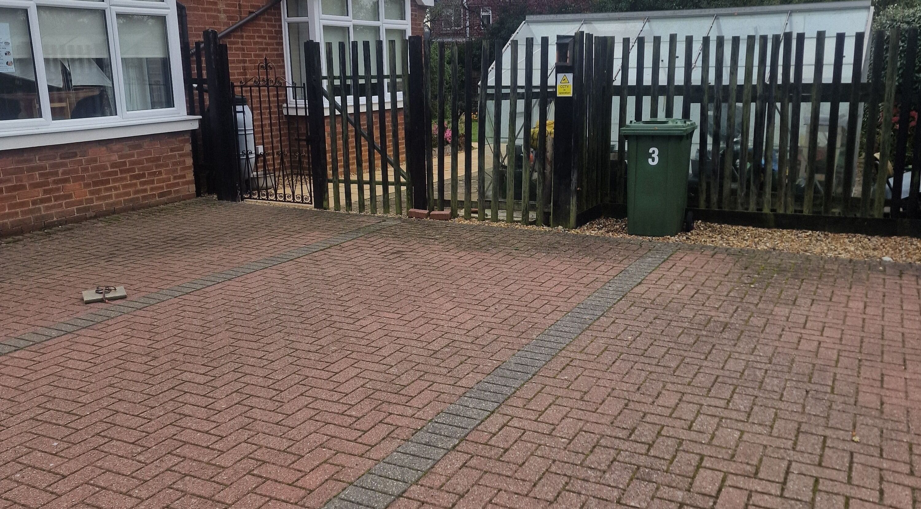Entrance pathway at Wilmslow Avenue, Woodbridge, featuring a welcoming brick design. Located in Woodbridge, England, GB.