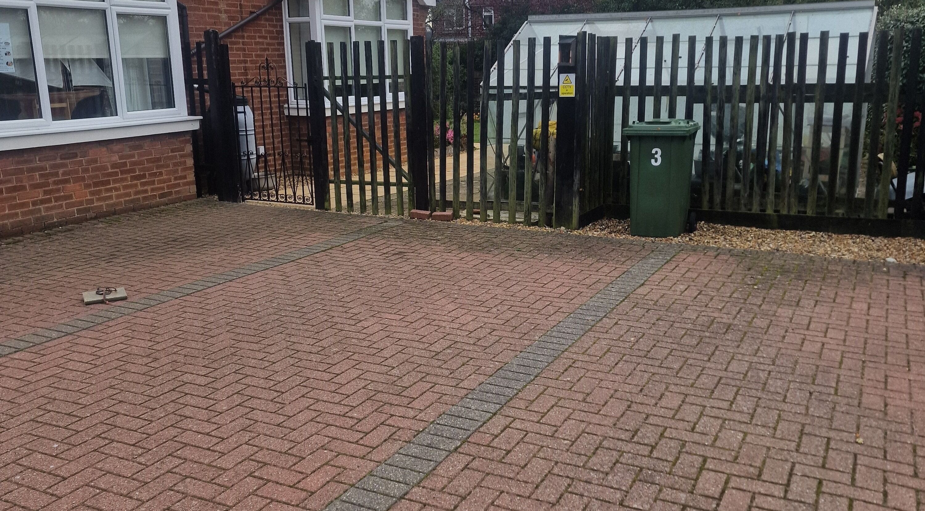 Entrance pathway at Wilmslow Avenue, Woodbridge, featuring a welcoming brick design. Located in Woodbridge, England, GB.