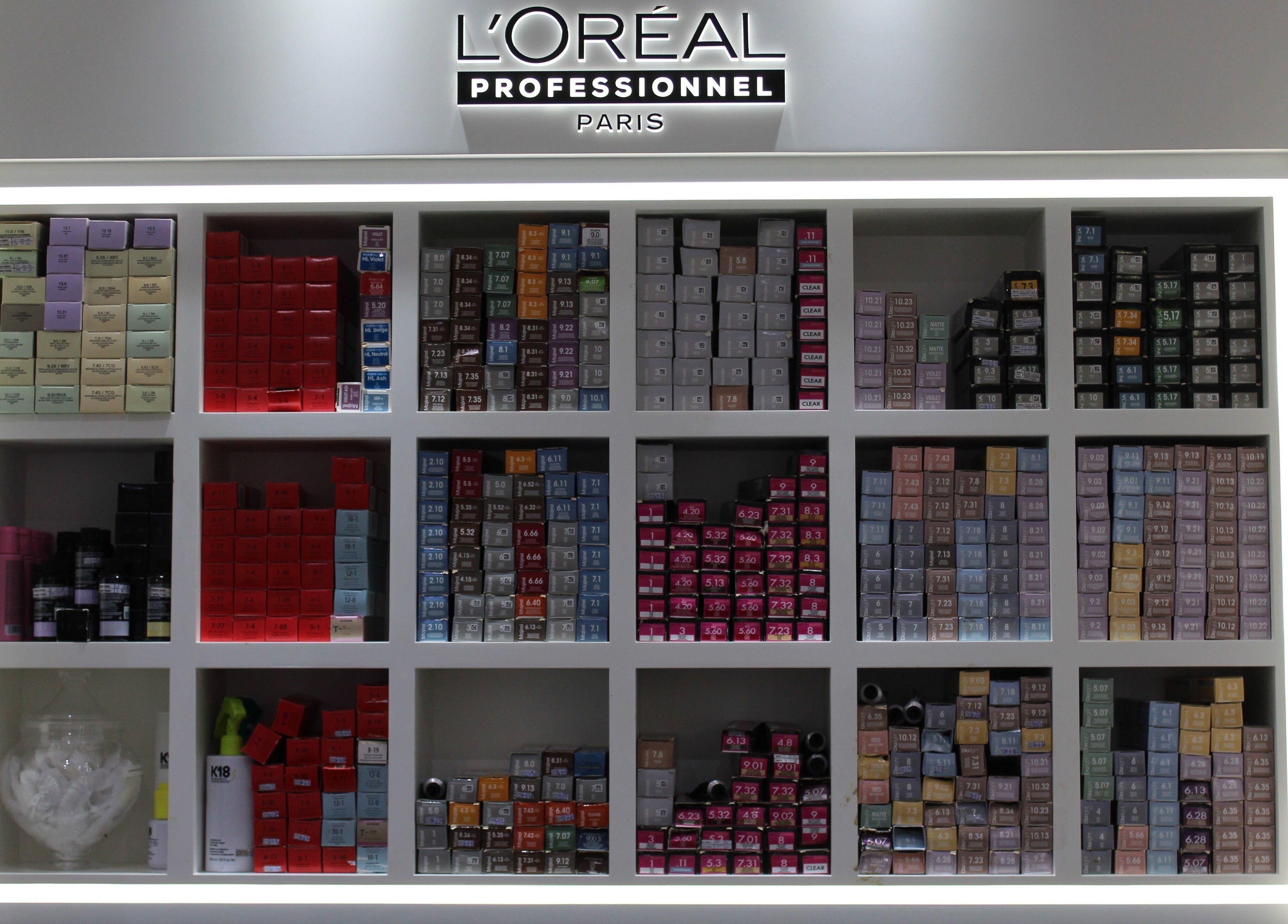 L'Oreal products displayed at The Salon at Yin Yang JBR, Dubai, AE, showcasing variety and elegance.
