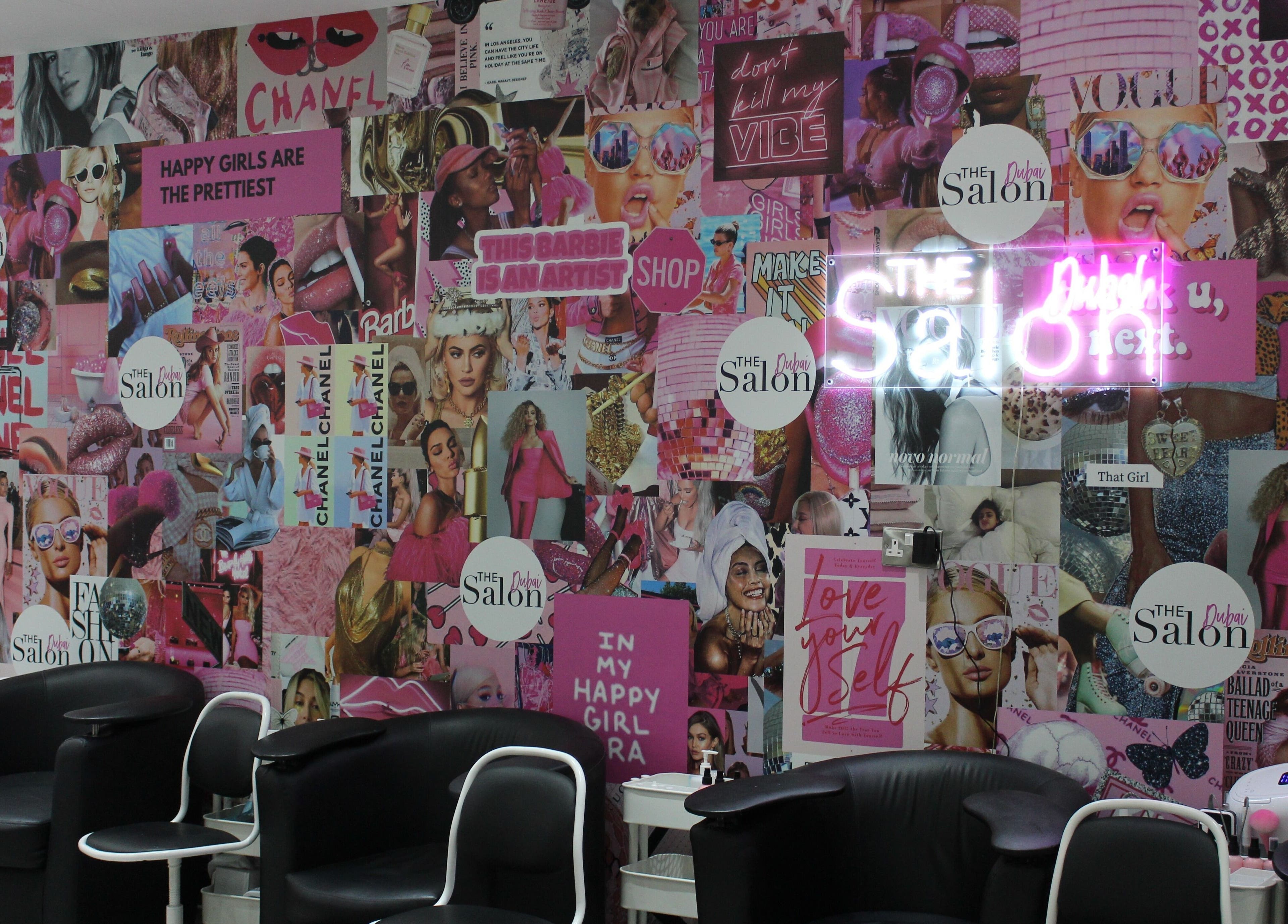 Vibrant collage wall in The Salon at Yin Yang JBR, Dubai, AE, showcasing chic beauty and fashion themes.
