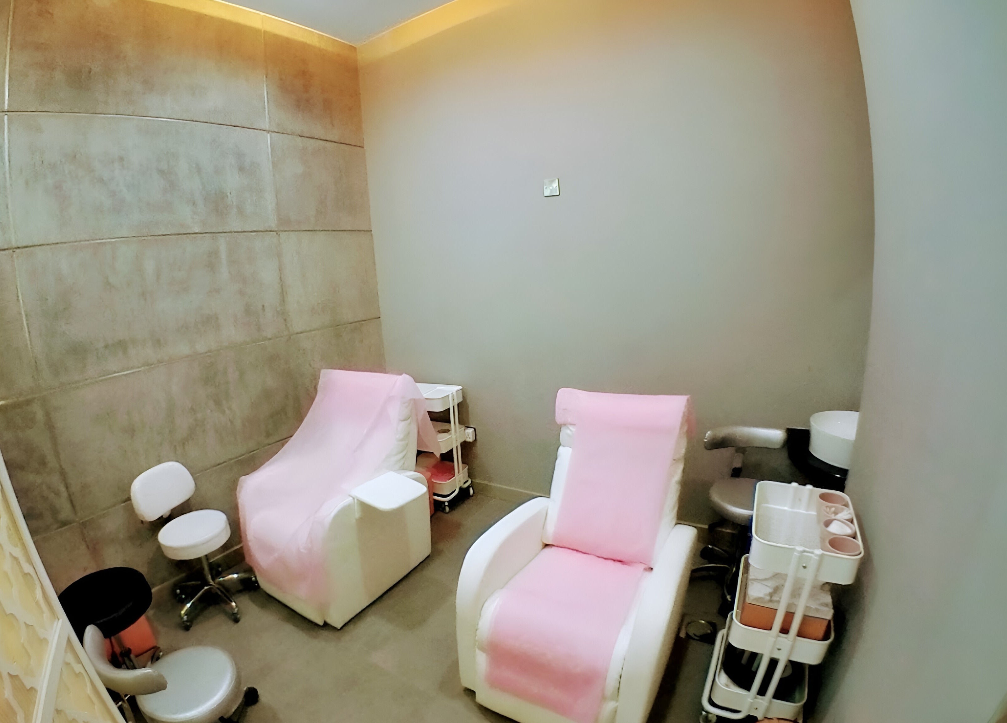 Luxurious pedicure chairs at The Salon at Yin Yang Al Wasl, Dubai, AE, invite relaxation and pampering.