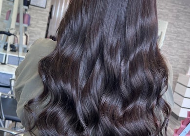 Shiny, wavy hairstyle transformation at Poppy Harrison Hair in Blackpool, England, GB.