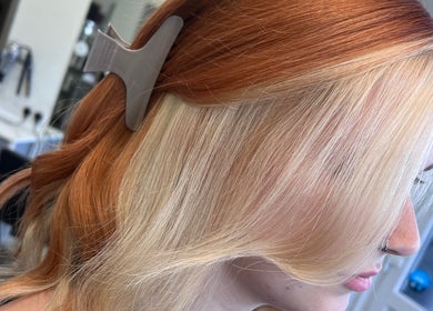 Vibrant auburn and blonde hairstyle at Poppy Harrison Hair, Blackpool, England, GB salon.