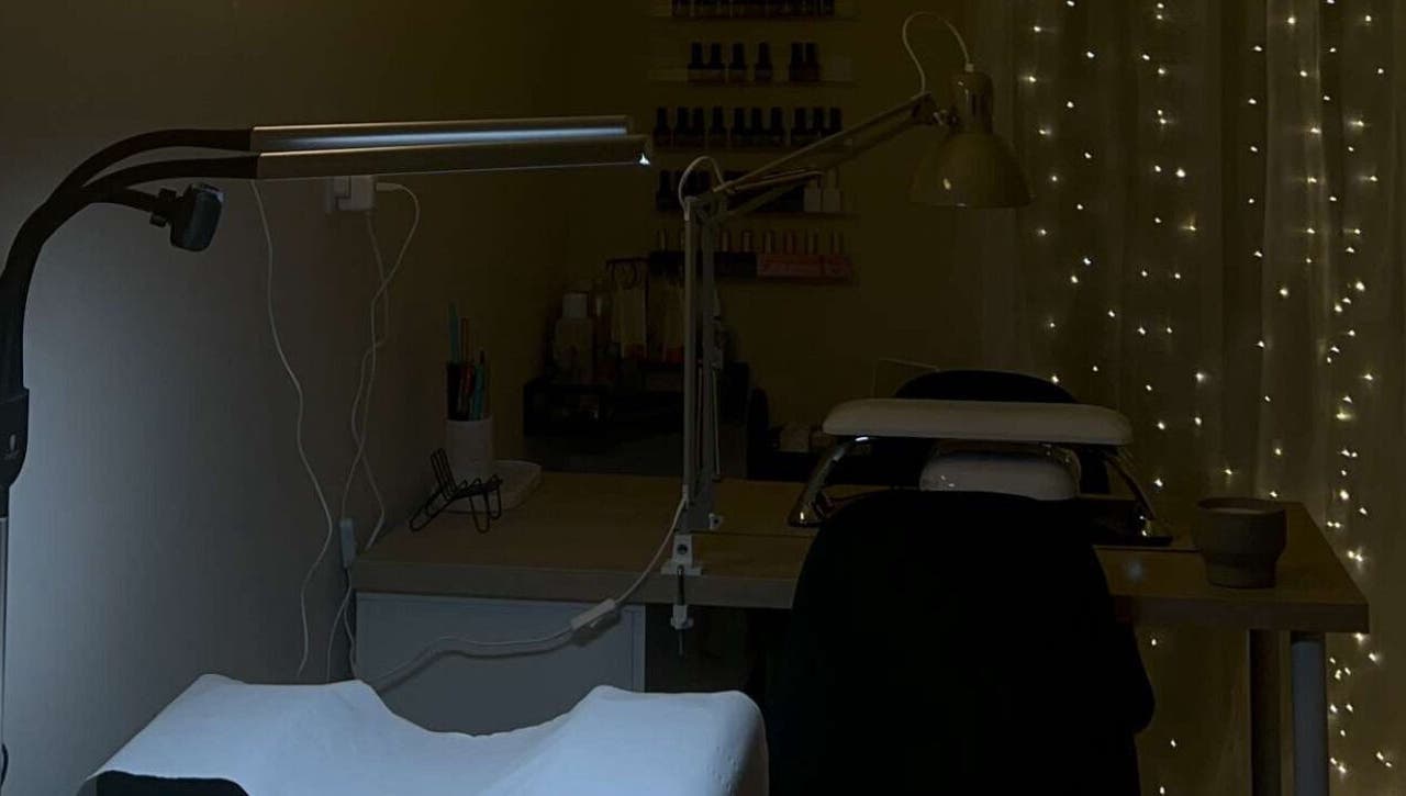 Serene manicure station at BY.M.R.B, Colchester, England, GB with ambient lighting and nail polish display.