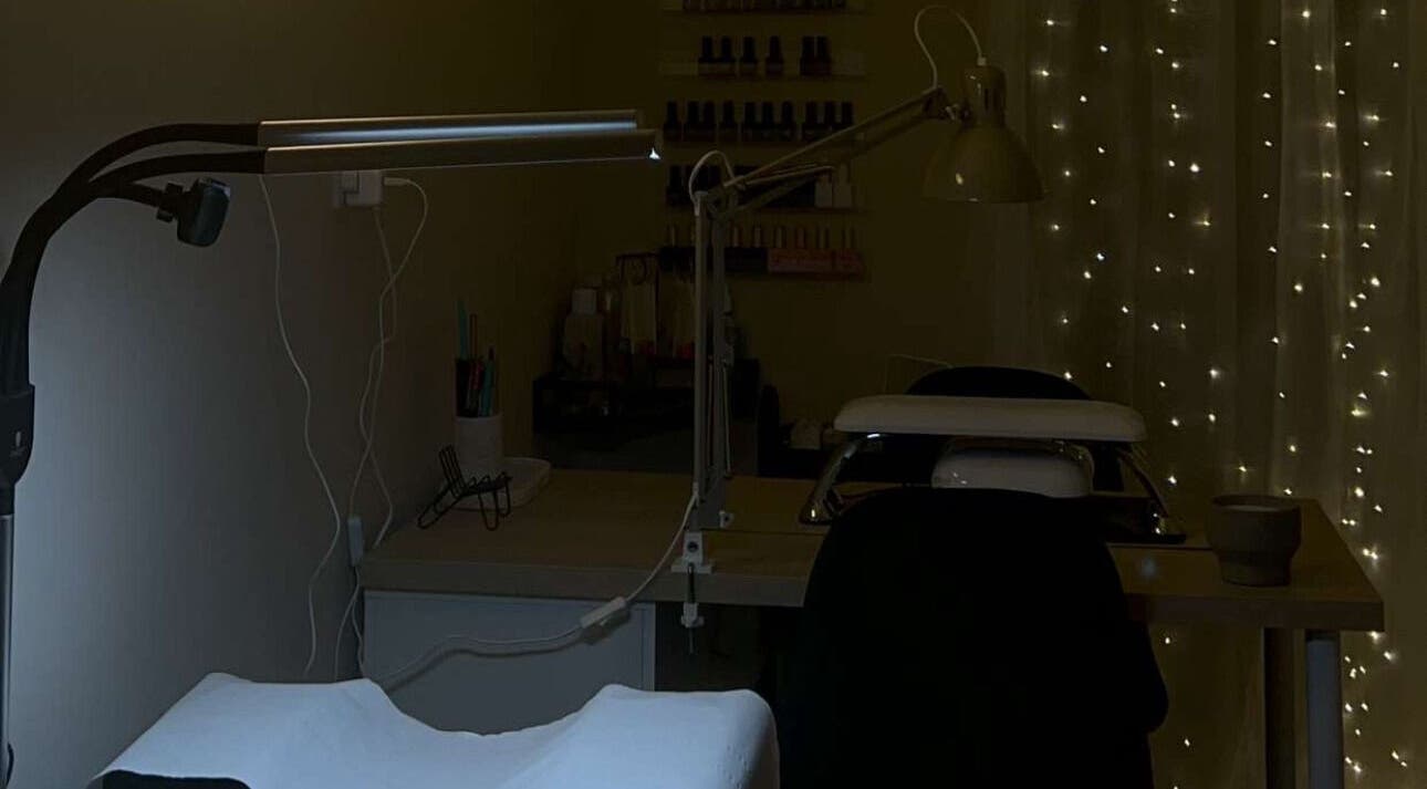 Serene manicure station at BY.M.R.B, Colchester, England, GB with ambient lighting and nail polish display.