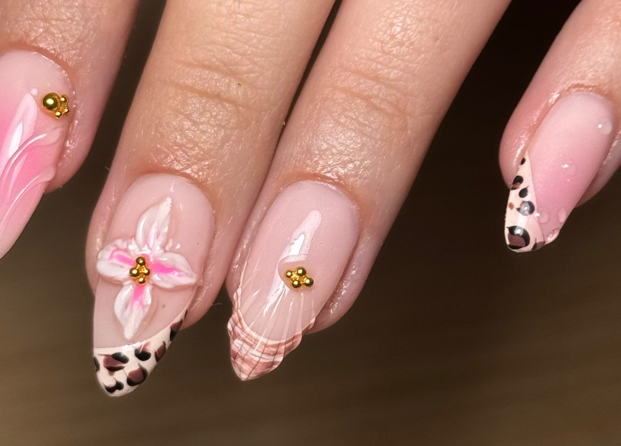 Beautiful nail art with floral and leopard designs at BY.M.R.B, Colchester, England, GB.