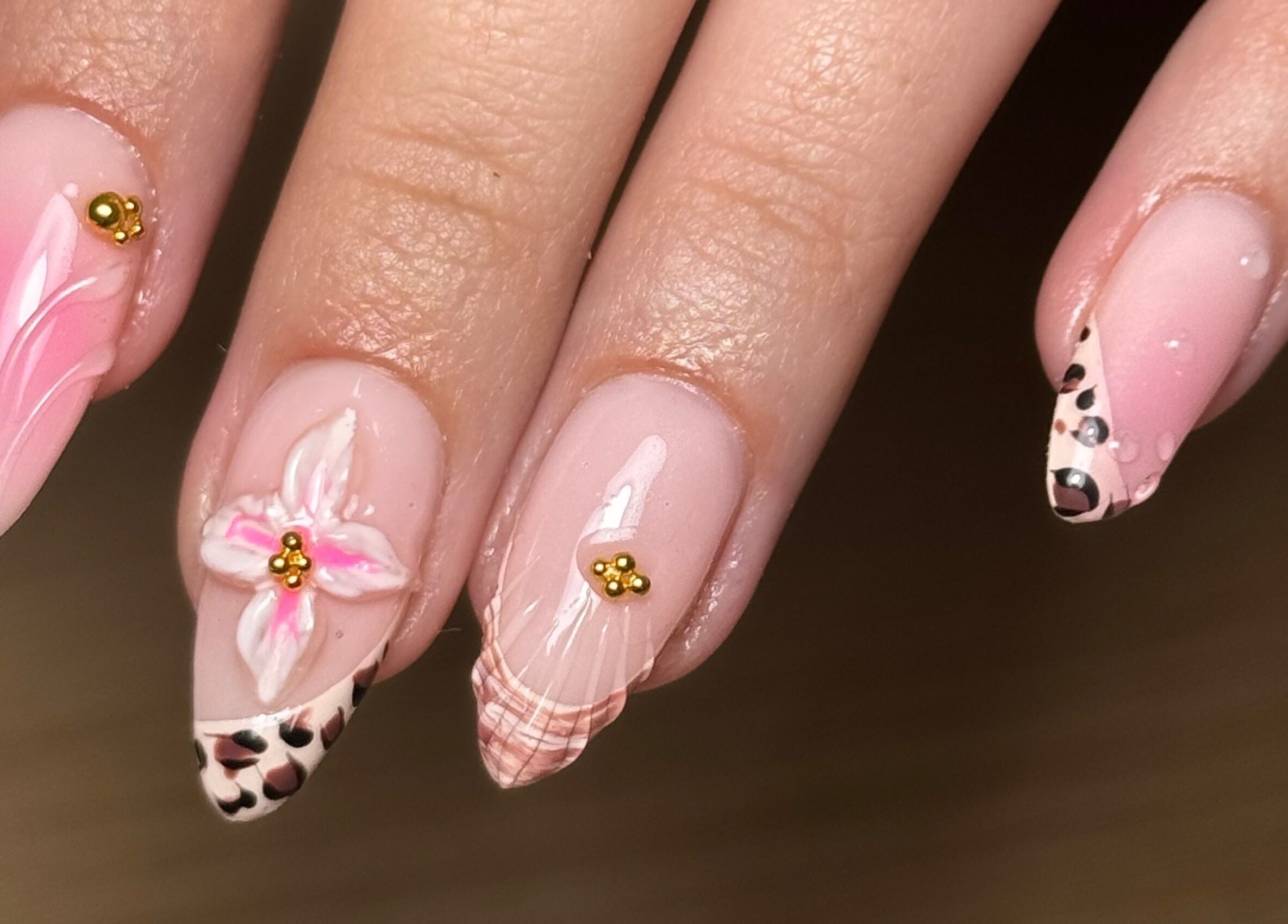 Beautiful nail art with floral and leopard designs at BY.M.R.B, Colchester, England, GB.