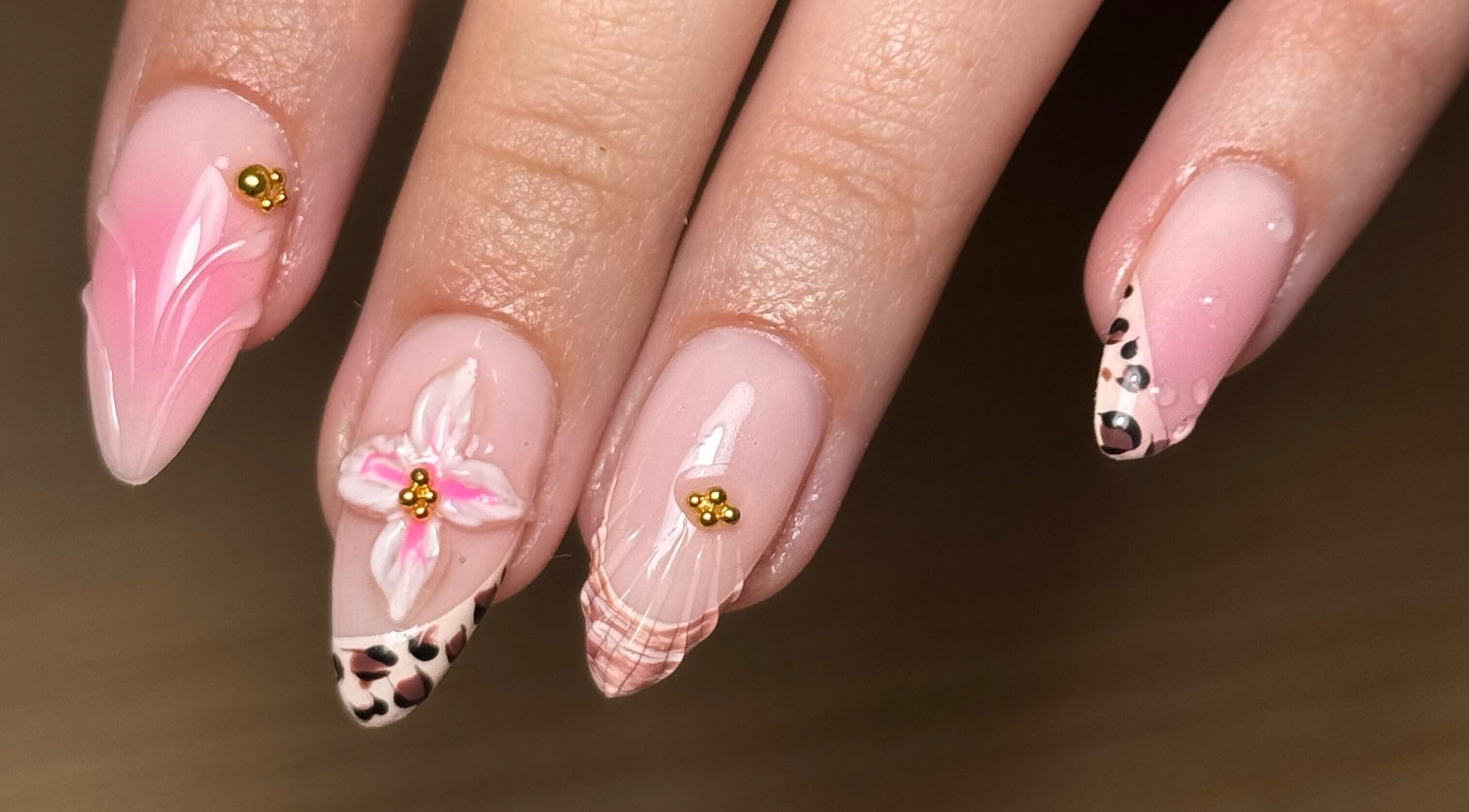Beautiful nail art with floral and leopard designs at BY.M.R.B, Colchester, England, GB.