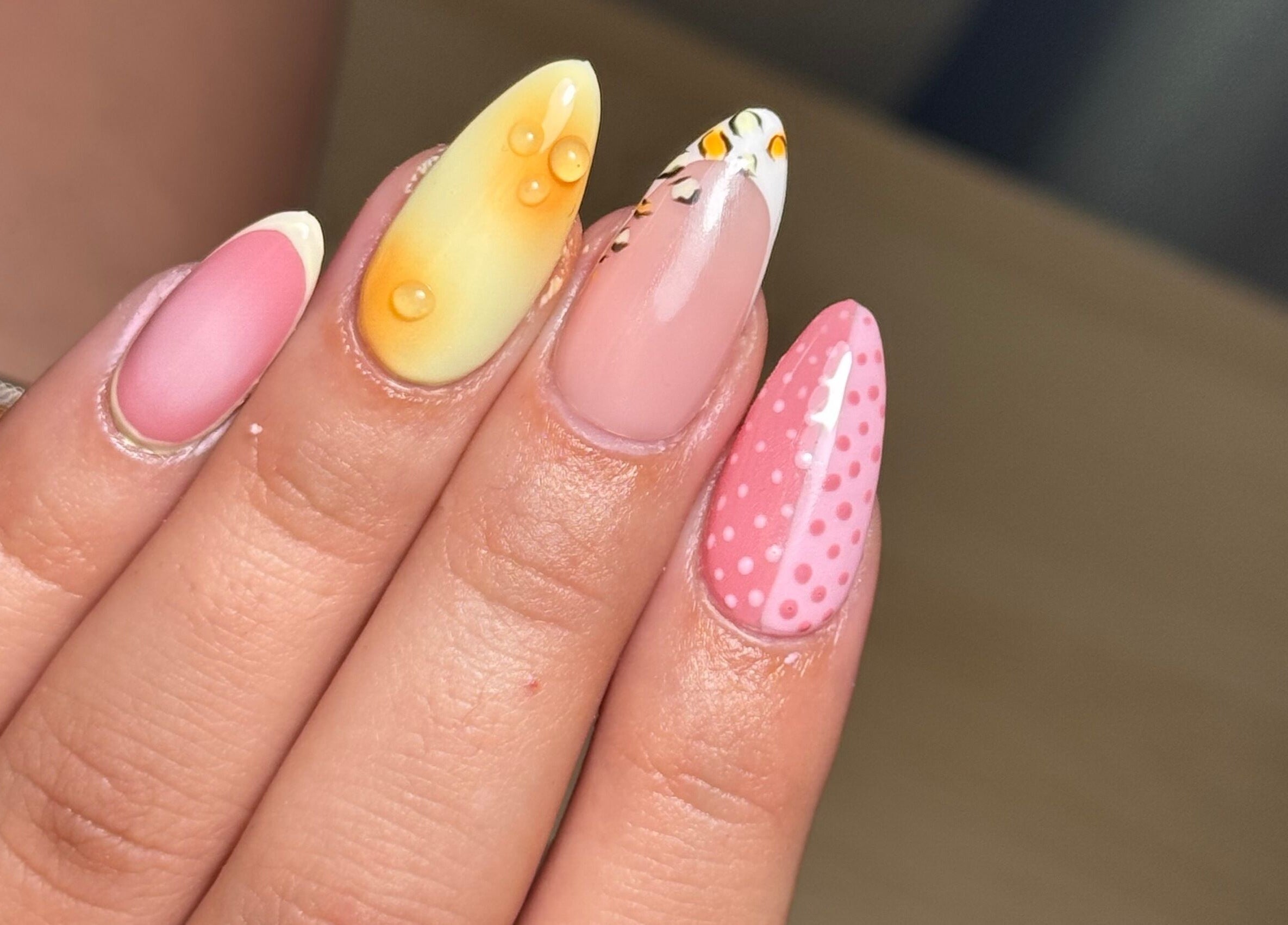 Vibrant nail art at BY.M.R.B in Colchester, England, GB featuring colorful and detailed designs.