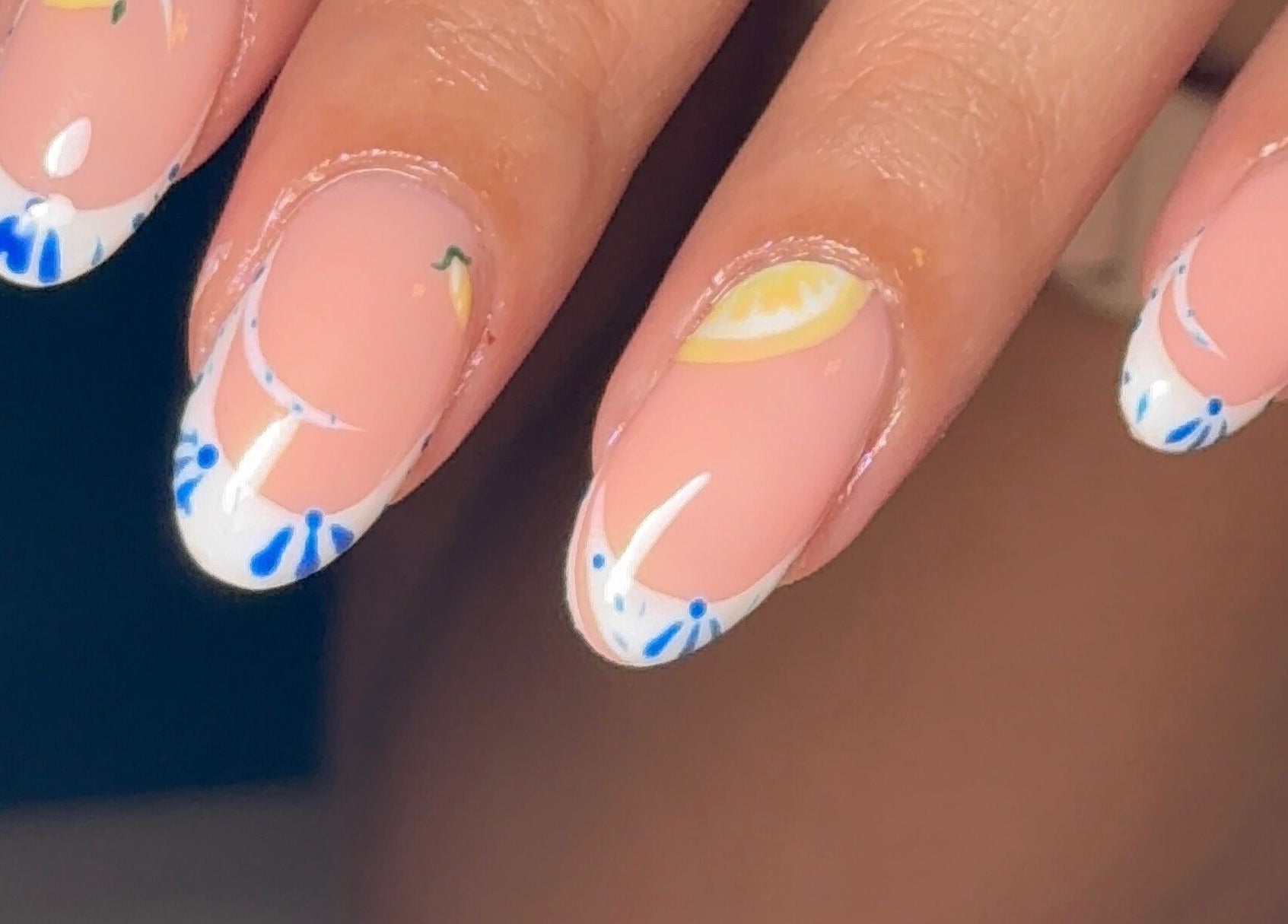 Beautiful blue floral nail art at BY.M.R.B, Colchester, England, GB showcasing intricate design.