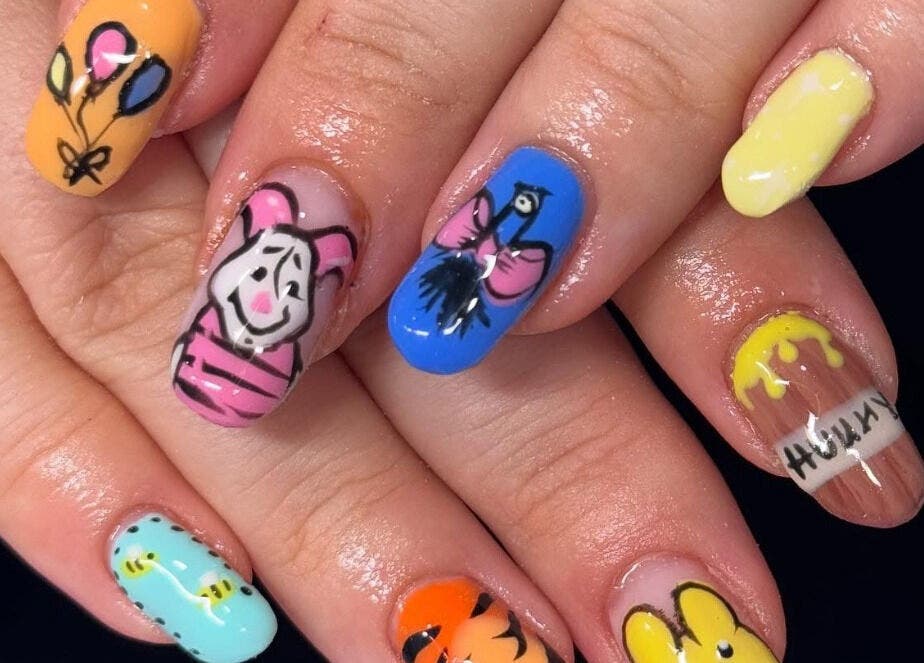 Colorful cartoon-themed nail art at By Tara-Jayne, Bridgwater, England, GB.