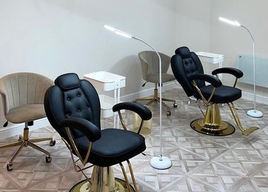 Modern beauty chairs at Faces by Holly Eastwood, Morecambe, England, GB, showcasing a chic salon space.