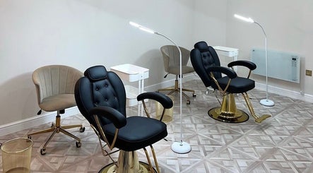 Modern beauty chairs at Faces by Holly Eastwood, Morecambe, England, GB, showcasing a chic salon space.