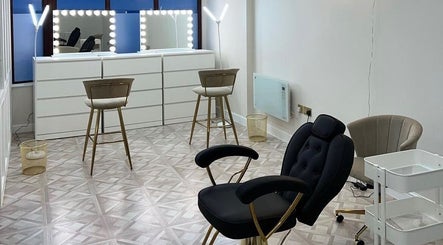 Luxurious beauty studio at Faces by Holly Eastwood, Morecambe, England, GB, with elegant chairs and vanity mirrors.