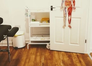 Tranquil treatment room with massage bed at The Hijamist, Stourbridge, England, GB.
