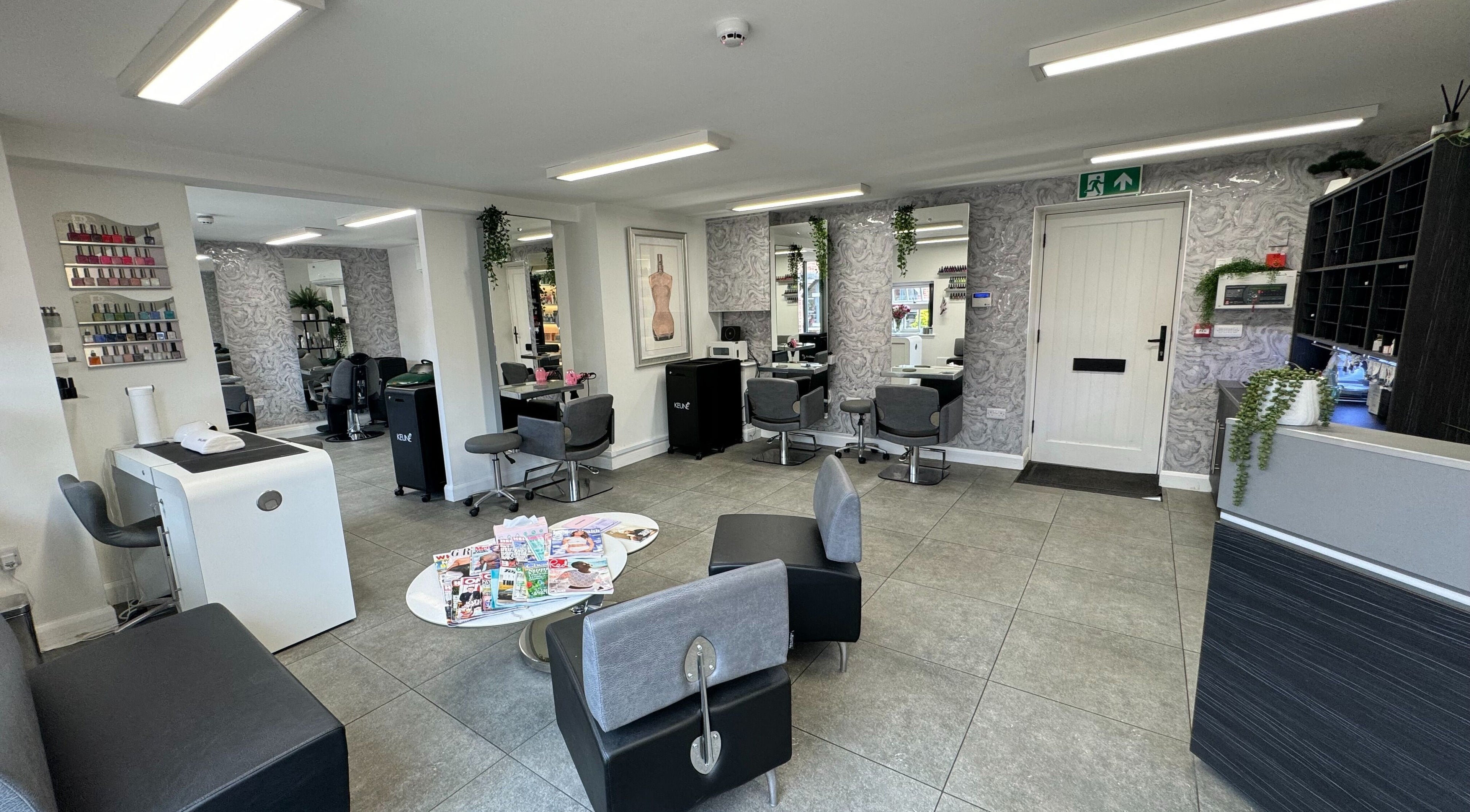 Elegant interior of The Scissor Psychologist - Aldford, Chester in Chester, England, GB with styling stations.