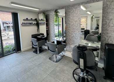 Chic salon interior at The Scissor Psychologist - Aldford, Chester, offering hair services in Chester, England, GB.