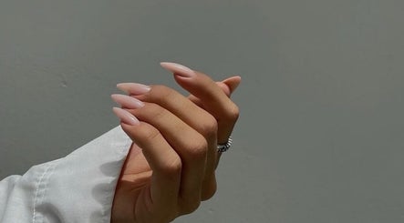 Stylish pink manicure at Mysa Nail Bar, Boston, Massachusetts, US showcasing elegant nail design.