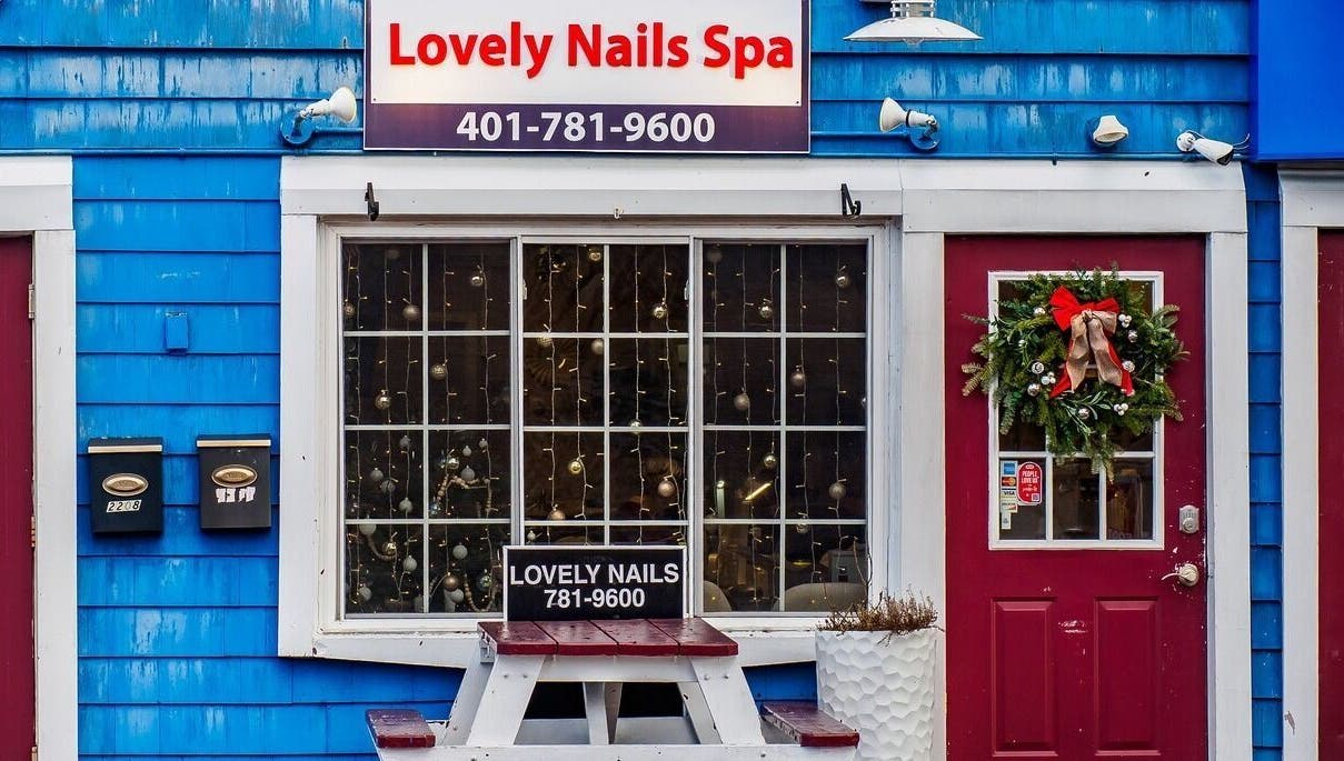 Lovely Nails Spa entrance with festive decor in Cranston, Rhode Island, US.