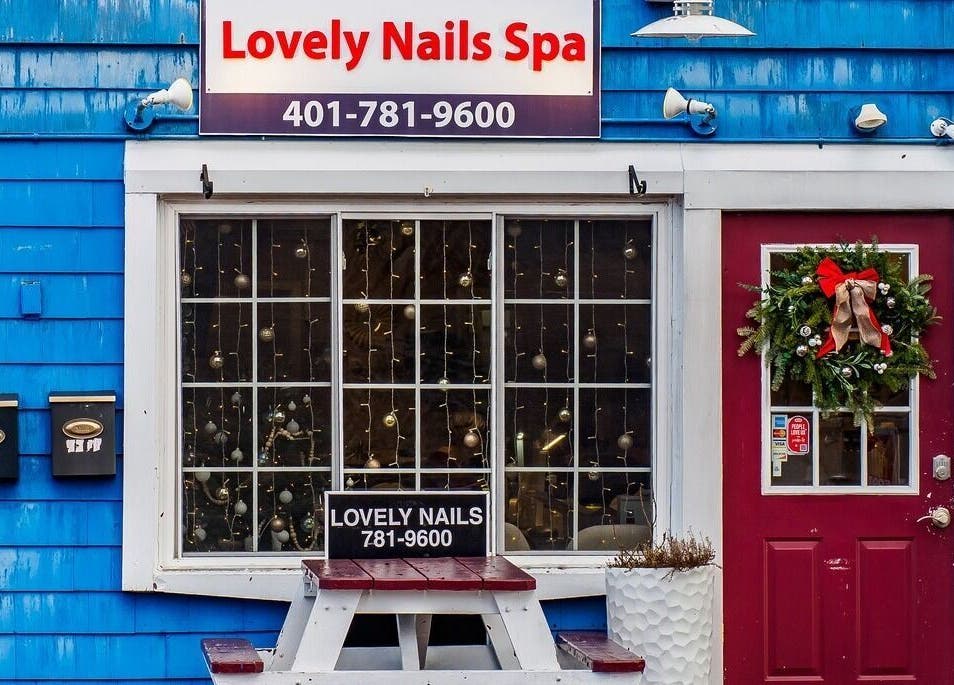 Lovely Nails Spa entrance with festive decor in Cranston, Rhode Island, US.