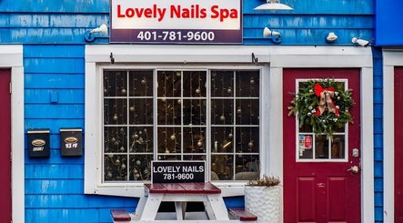 Lovely Nails Spa entrance with festive decor in Cranston, Rhode Island, US.