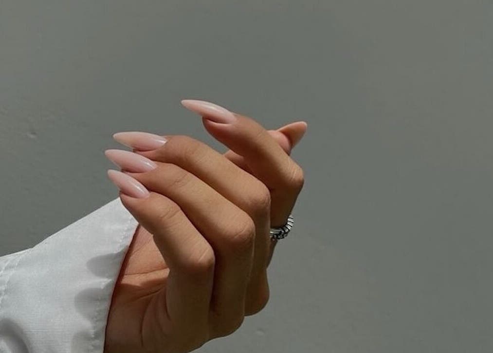 Elegant manicured hand at Mysa Nail Bar in Boston, Massachusetts, US.