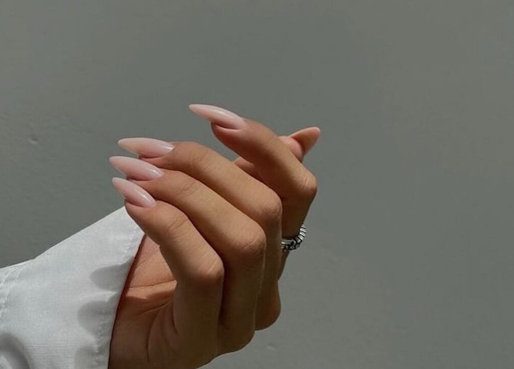 Elegant manicured hand at Mysa Nail Bar in Boston, Massachusetts, US.