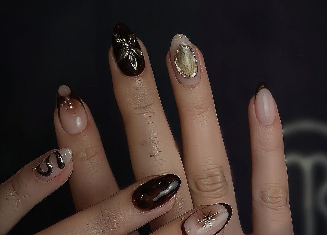 Elegant nail art at Mysa Nail Bar in Boston, Massachusetts, US, showcasing intricate designs.
