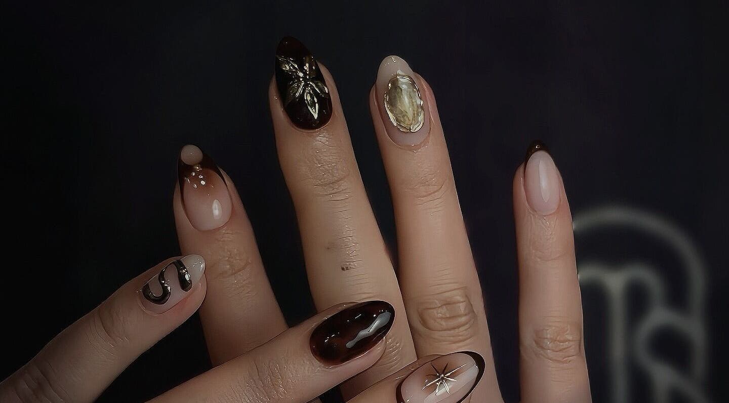 Elegant nail art at Mysa Nail Bar in Boston, Massachusetts, US, showcasing intricate designs.