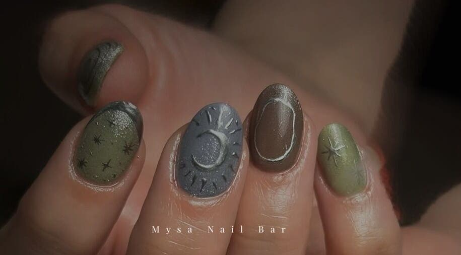 Celestial nail art featuring stars and crescent designs at Mysa Nail Bar, Boston, Massachusetts, US.