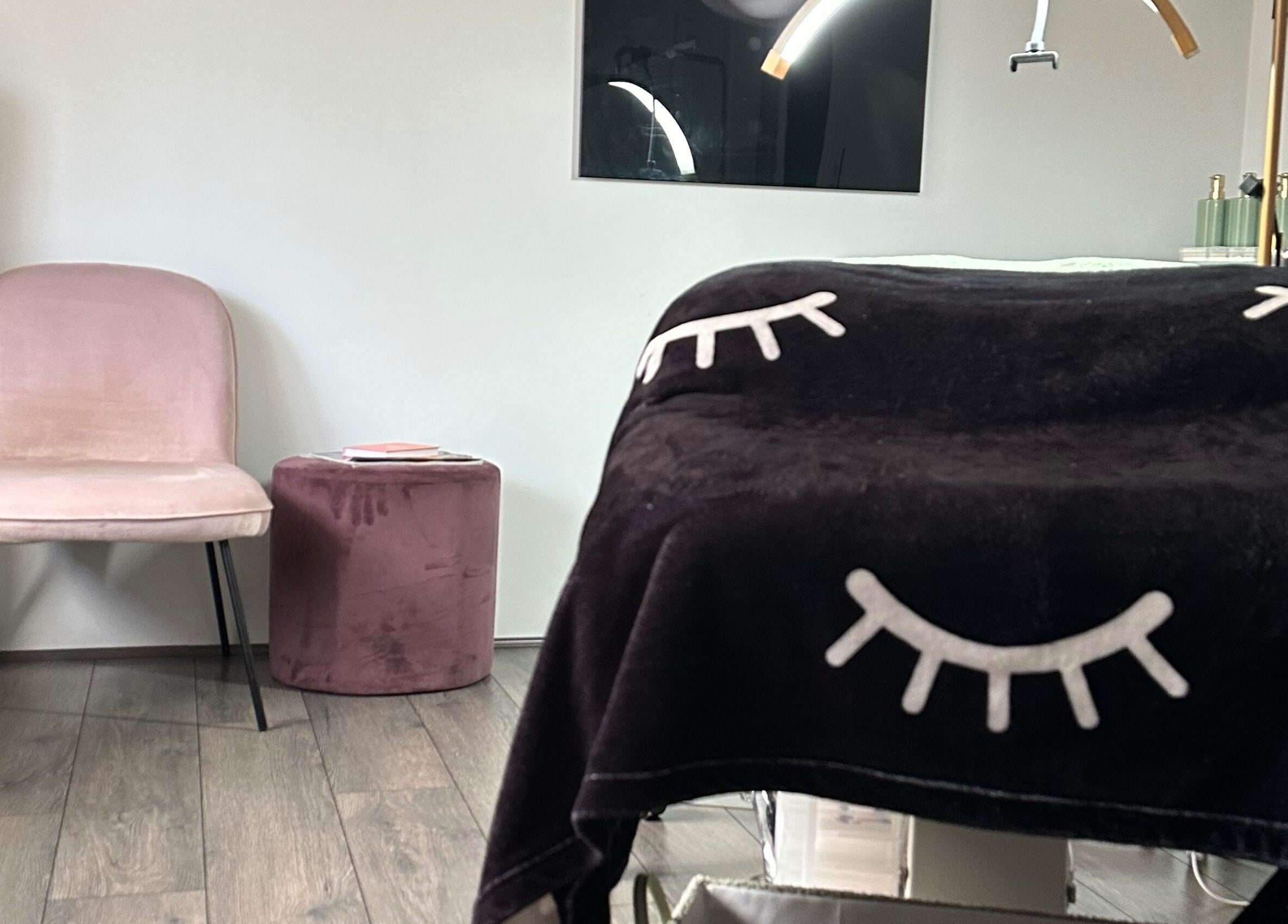 Inviting space at Kitty Meow Wax & Brow, Meadow Springs, Western Australia, AU with plush chair and decor.