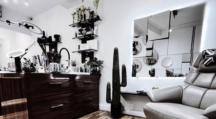 Chic modern salon interior at Lash Centre, Portsmouth, England, GB with stylish decor and comfortable seating.