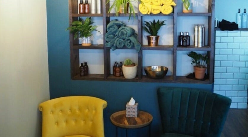 Stylish shelves and seating at Lazarus Hair, Brighton, England, GB enhance the modern ambiance.