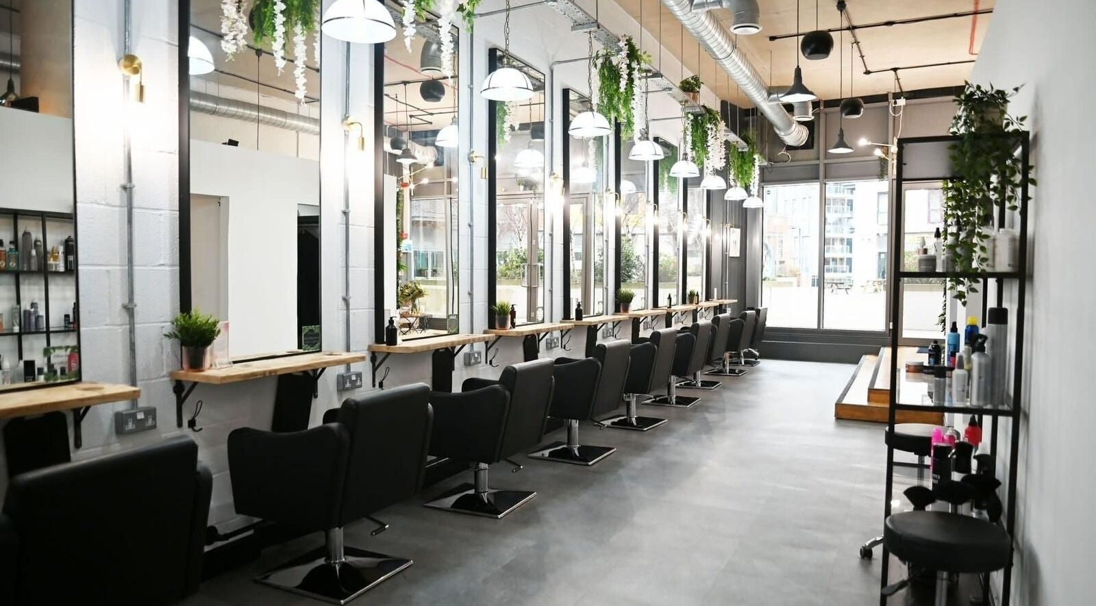 Modern salon interior at Charlotte W Hairstylist, Southampton, England featuring chic styling stations.