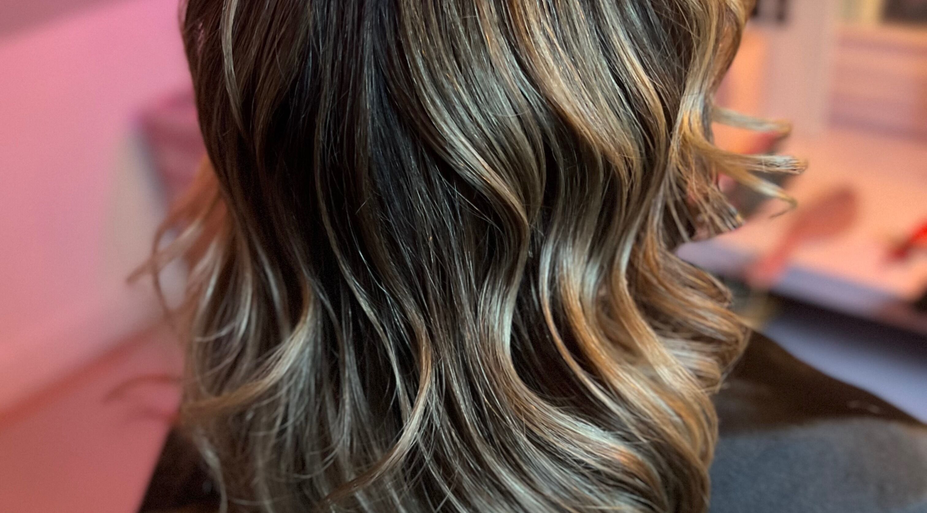 Smooth wavy hairstyle at Enchanted - Hair-Beauty-Aesthetics in Sutton-in-ashfield, England, GB.