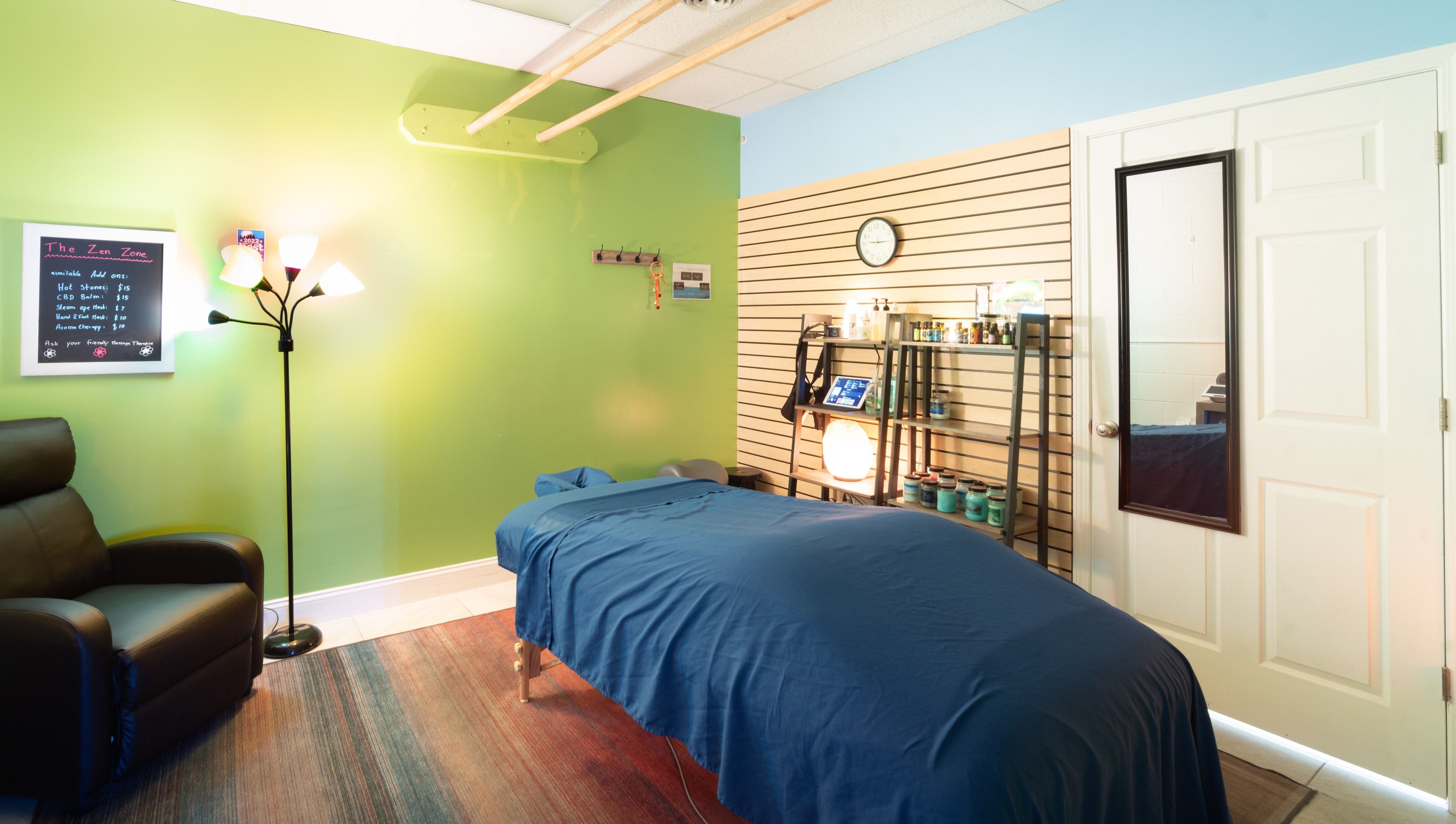 Tranquil massage room at The Zen Zone Wellness - Middletown, Blue Ridge Manor, Kentucky, US with cozy decor.