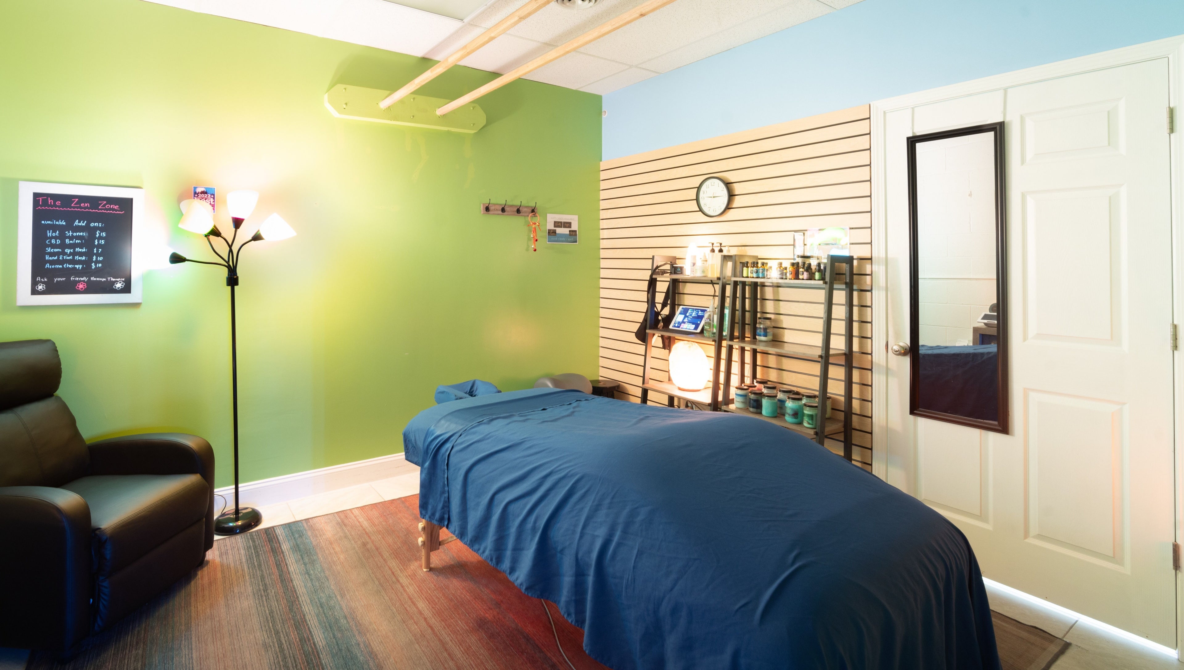 Tranquil massage room at The Zen Zone Wellness - Middletown, Blue Ridge Manor, Kentucky, US with cozy decor.