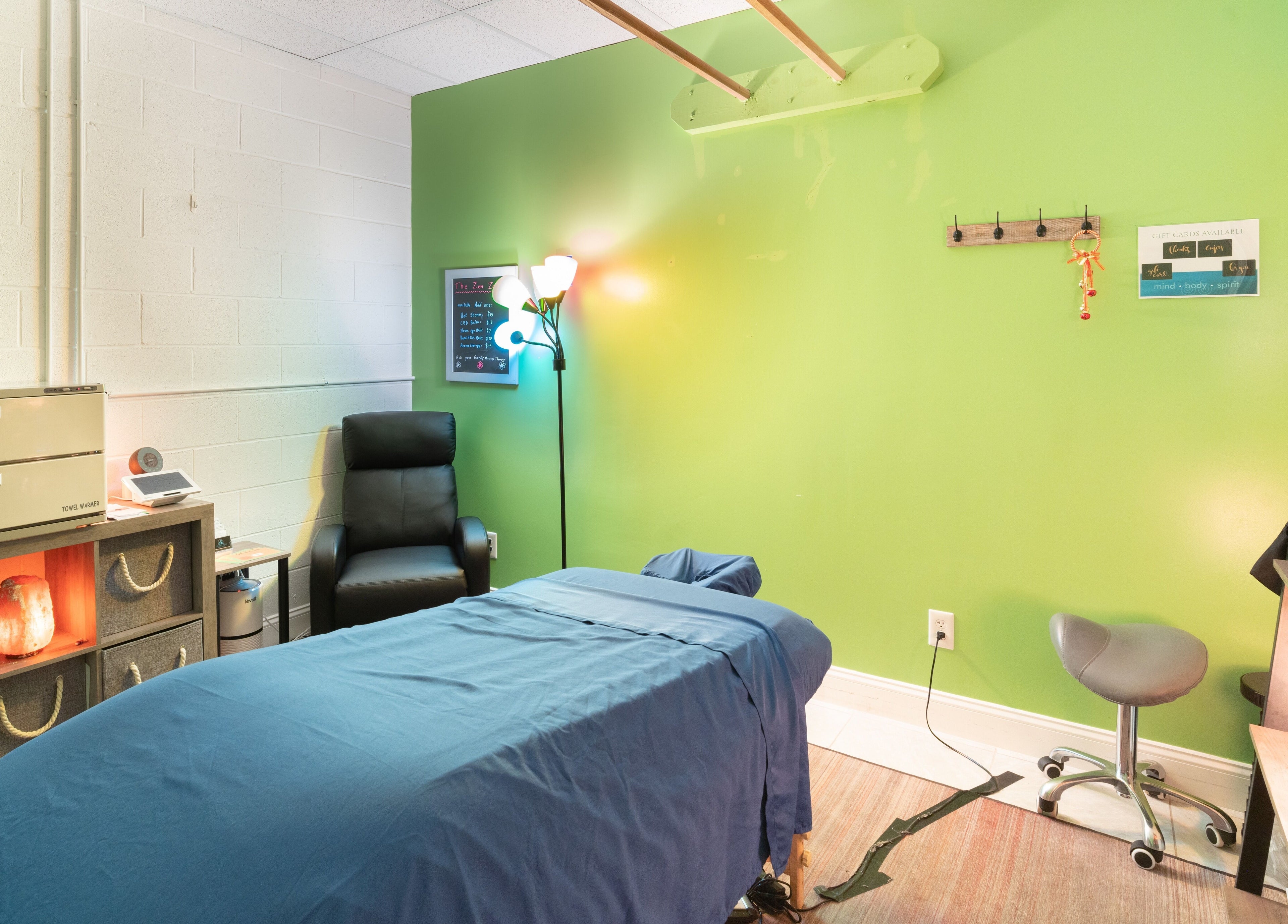 Tranquil massage room at The Zen Zone Wellness - Middletown, Blue Ridge Manor, Kentucky, US.