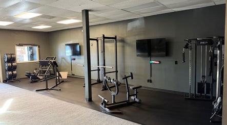 Equipment-filled gym at TNT Personal Training Studio in Duluth, Georgia, US.
