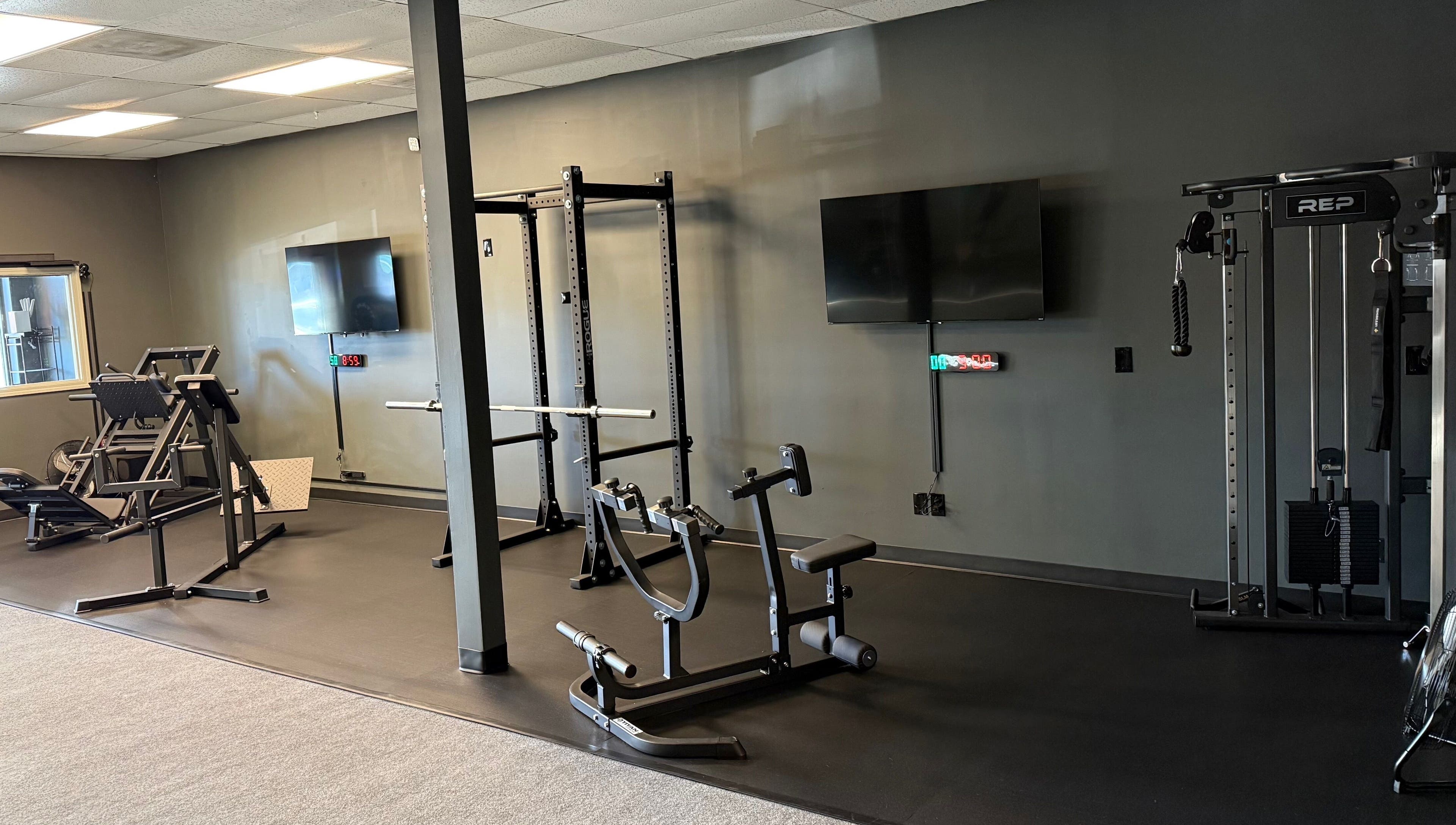 Modern gym equipment at TNT Personal Training Studio in Duluth, Georgia, US for personalized workouts.