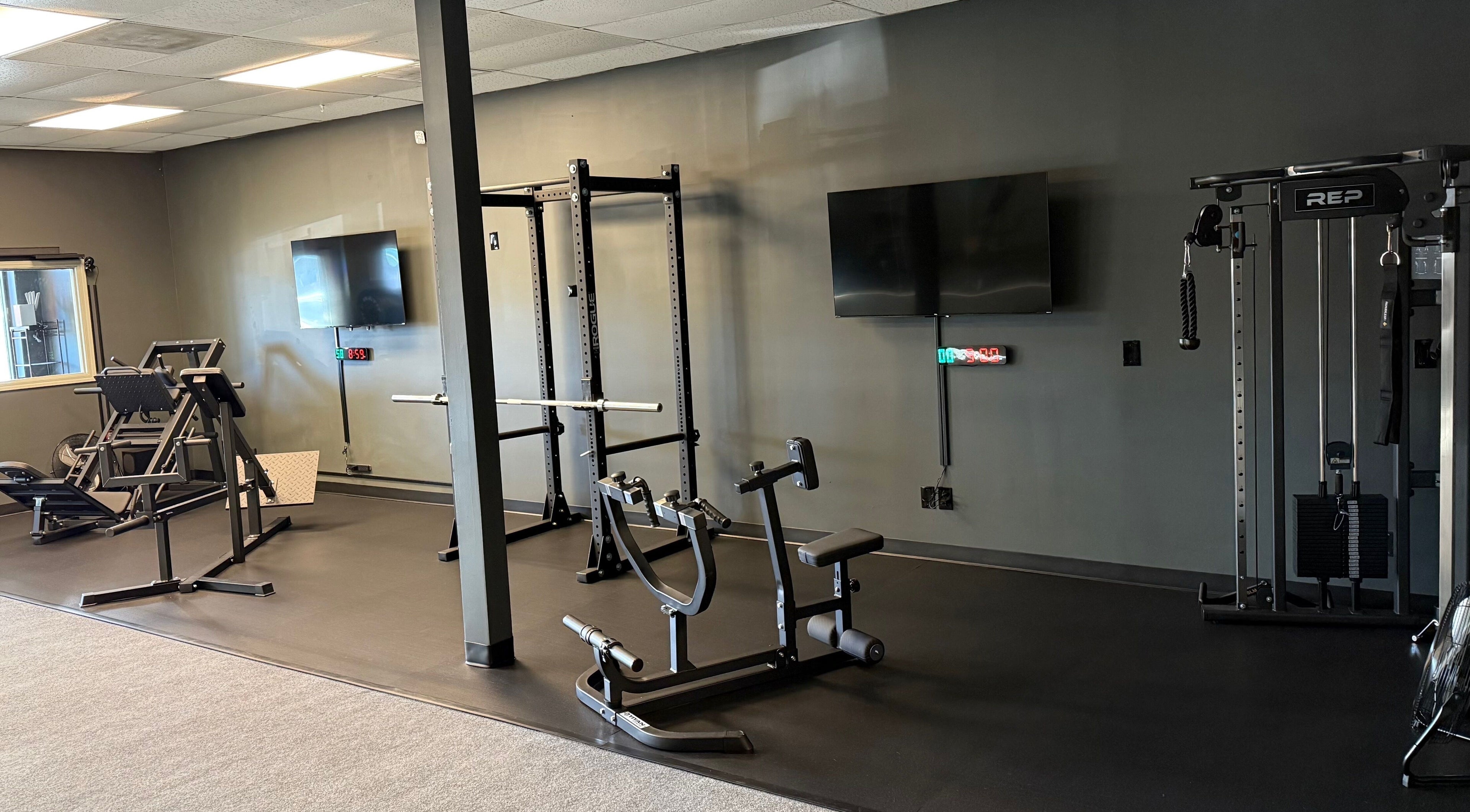 Modern gym equipment at TNT Personal Training Studio in Duluth, Georgia, US for personalized workouts.