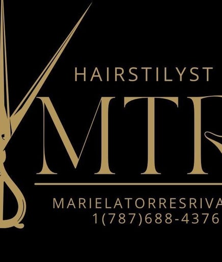 Logo dorado de Mariela Torres Hair Stilyst en Dunamis Salón & SPA, San Juan, San Juan, PR.