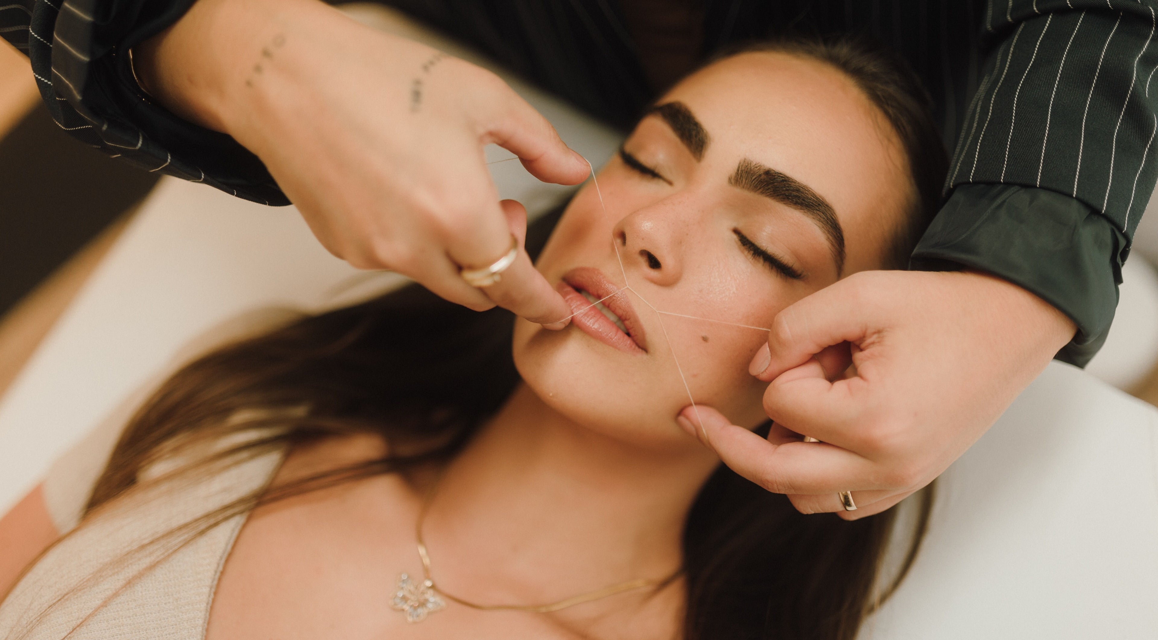 Expert facial threading at By Odara Beauty, located in Gold Coast, Queensland, AU.